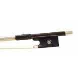 Fine French silver mounted violin bow by and stamped E. Sartory á Paris, the stick round, the