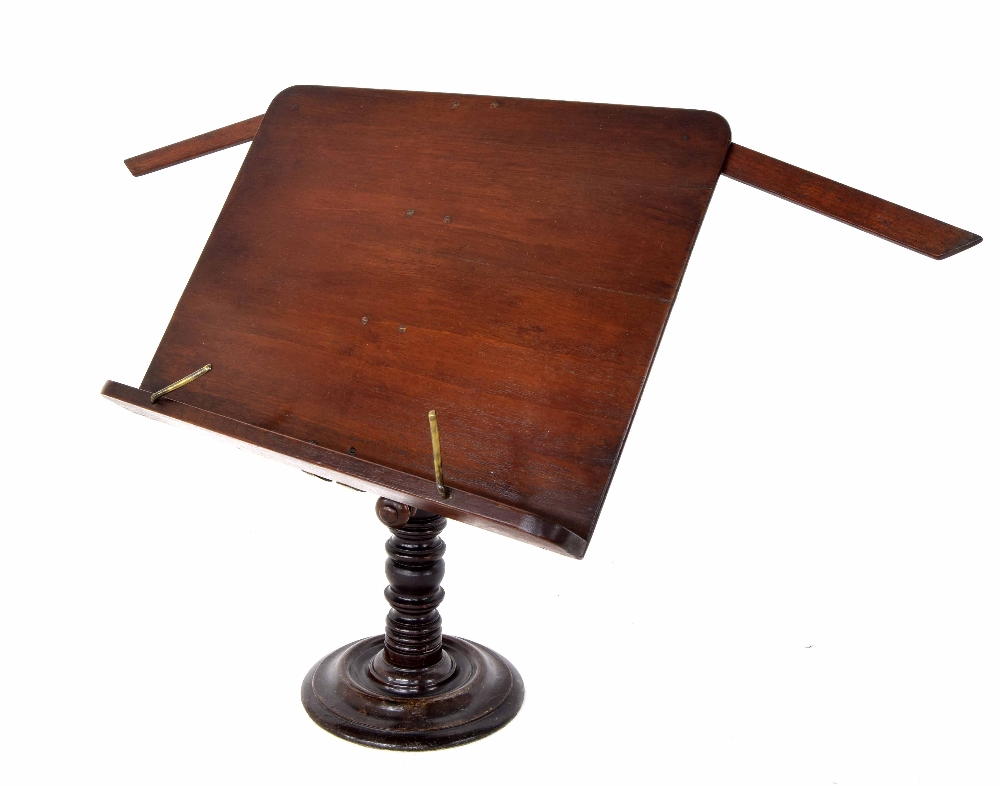 19th century mahogany music ledge upon an adjustable turned stand; together with another mahogany