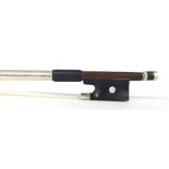 Nickel mounted violin bow stamped Poirson á Paris, the stick round, the ebony frog inlaid with pearl