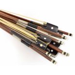 Five various nickel mounted violoncello bows, also two violin bows (7)