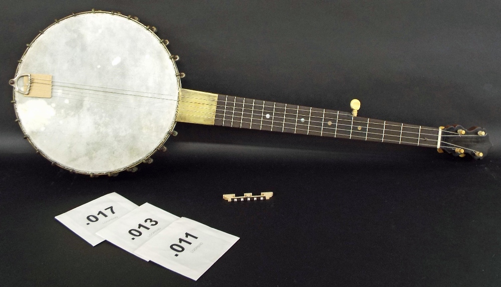 Five string open back banjo inscribed E.C. Dobson, Maker, New York, USA on a plaque to the dowel