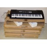 Four new and boxed Gear4music 51 note keyboards with padded gig bags (4)