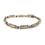 9ct yellow gold diamond and gem set line bracelet, 11.9gm, 5mm wide, 8.25" long