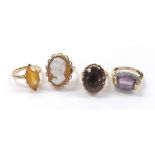 Four assorted decorative 9ct dress rings, 21.3gm (4)