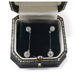 Pair of white gold two stone diamond set drop earrings, approx total diamond weight 1.43ct, boxed (