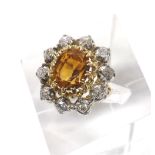 Antique style 18ct diamond and citrine cluster ring, the oval centre stone estimated 4.67ct