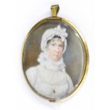 Miniature School (19th Century) - oval portrait of a lady, inscription verso, within a gilt metal