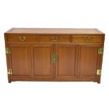 Contemporary Chinese hardwood sideboard, with three drawers over four panelled cupboards with