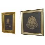 Bedouin Jewellery - two framed and mounted white metal tassled pendants, both set with coloured