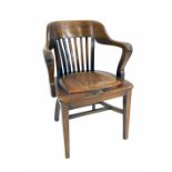 Mahogany captain's type armchair, with vertical splats, leather drop-in seat upon square tapering