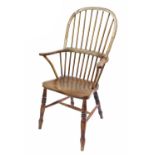 Elm seat comb back Windsor armchair with turned supports, the back 43" high (spindles require re-