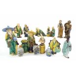 Collection of eleven Chinese mudmen figures; modelled in various pursuits, tallest 8" high; also
