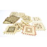 Twelve French hand embroidered mats, 6" x 6" approx, box