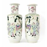 Matched Pair of Chinese famille rose porcelain Rouleau vases, 12" high and 11.5" respectively (2)