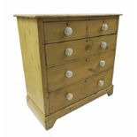 Victorian stripped pine chest of two short over three long graduating drawers