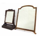 Mahogany framed toilet mirror, 17" high, together with a larger strut dressing mirror with shaped