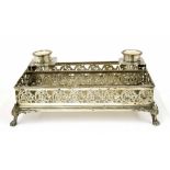 WMF Wepco silver plated rectangular inkstand, with a pierced foliate gallery upon cast paw feet,