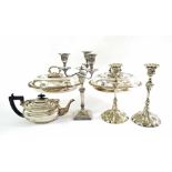 Silver plated ware, to include a pair of lidded entree dishes, pair of candlesticks, a centrepiece