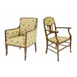 Edwardian mahogany inlaid upholstered wing armchair, with floral covering upon square tapered