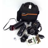 Minolta X-700 camera, with associated lens and flash, within fitted carry case