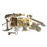 Quantity of door furniture, to include hinges, escutcheons, anchor door knocker and various keys;