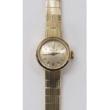 Omega 9ct lady's bracelet watch, circa 1963, small silvered dial with baton markers, cal. 580 17