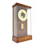 Good electric clock in the manner of Cluse, the 6.5" cream dial enclosing a skeletonised centre with