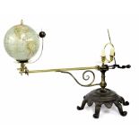 Interesting and rare rotating globe, operated by a crank handle at the end of a cylindrical brass