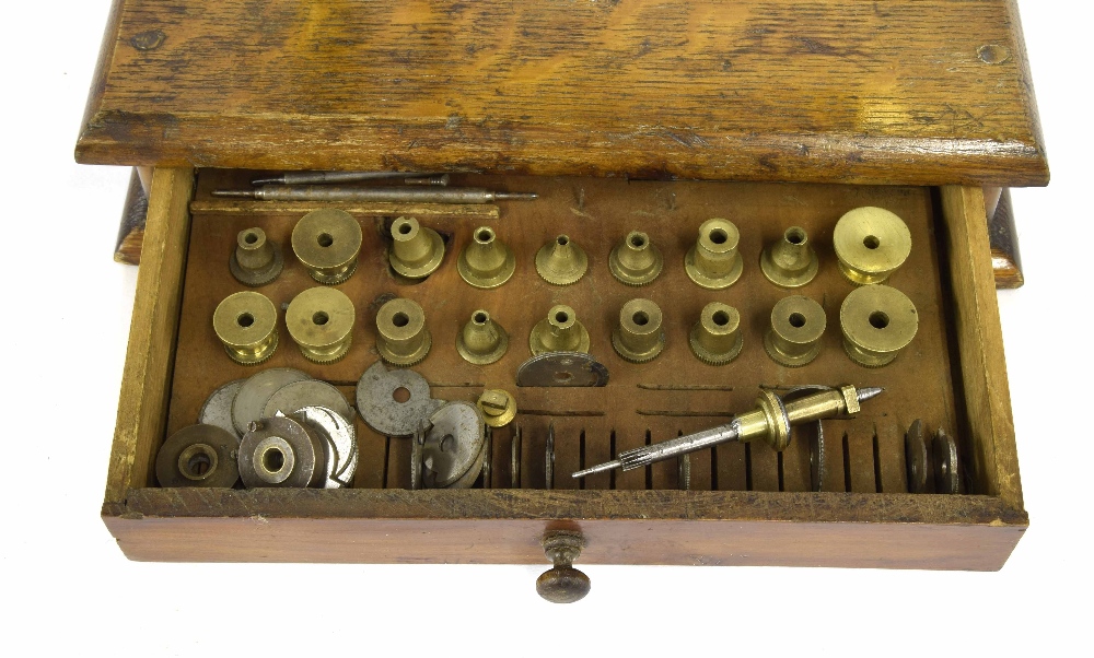 Good early brass wheel cutting tool, upon a rectangular oak base fitted with a drawer containing - Image 2 of 2