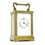 Carriage clock timepiece, within a corniche brass case, 6" high