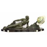 Large impressive patinated bronze and black marble Art Deco figural electric globe clock, the