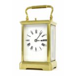 Repeater carriage clock striking on a gong, within a corniche brass case, 6.75" high