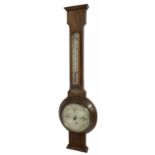 Walnut barometer/thermometer with 6.5" silvered dial