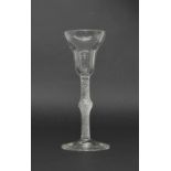 18th century cordial glass, the round funnel bowl on an opaque air twist stem and circular foot, 5.