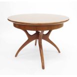 Vintage Formica circular extending dining table, the drum top upon stylized supports on four