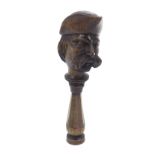 Continental screw-action novelty treen nutcracker, carved with the bust of a gentleman with a