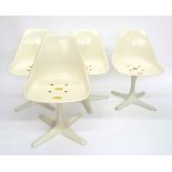 Set of four Arkana 115 dining chairs, the white fibreglass tulip type chairs upon white painted cast