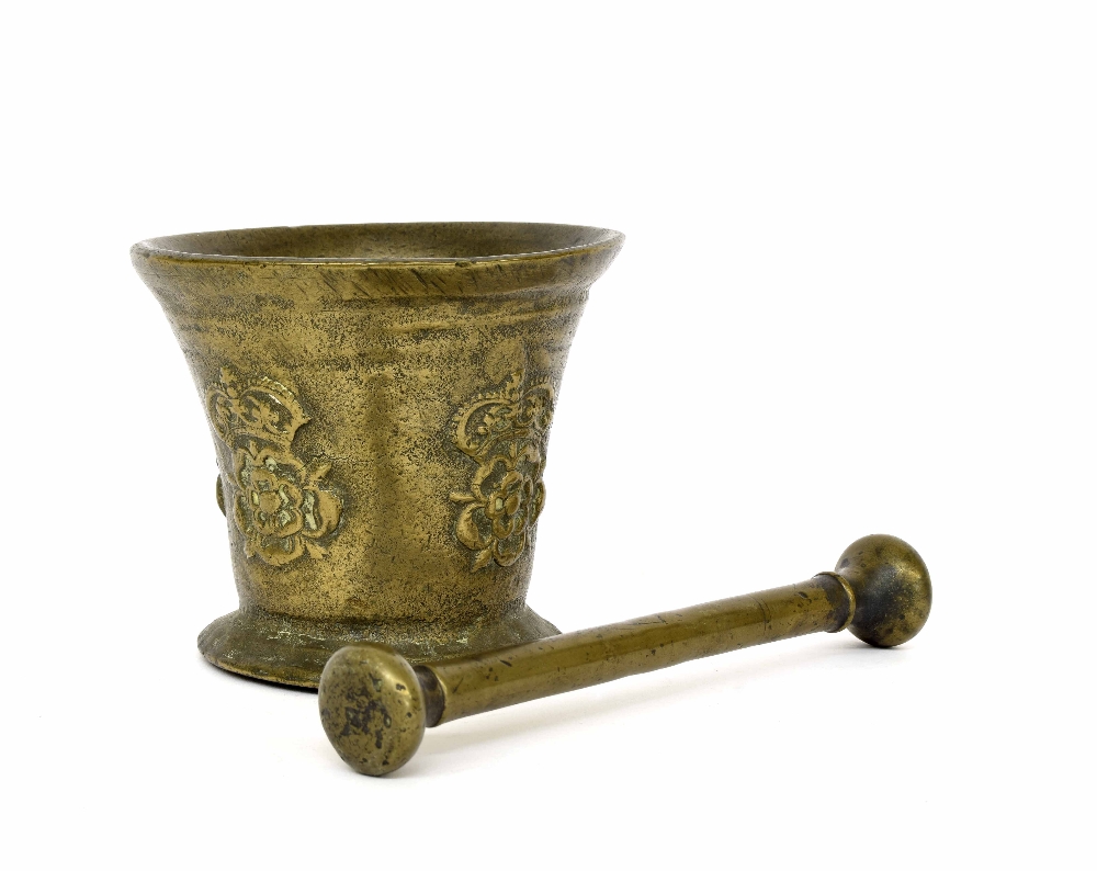 18th century cast bronze pestle and mortar, decorated in low relief with crowned Tudor roses, the