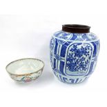 Antique Chinese provincial blue and white baluster vase, the sides decorated with panels of