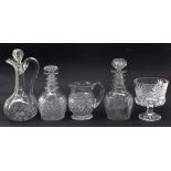 Two good quality 19th century cut glass triple ring neck decanters and stoppers, clear glass