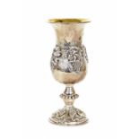 Portuguese silver-gilt goblet, the bell shaped bowl repousse with fruiting vines upon a circular