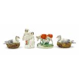 Pair of Staffordshire small tureens and covers, modelled as birds seated upon their nests, 7"