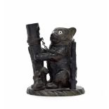 Late 19th century novelty cast inkwell in the form of a Warwickshire bear, with a hinged head