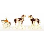 Pair of 19th century Staffordshire porcelain dogs, modelled standing with liver and white coats, 4.