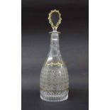 19th century French glass decanter and stopper, with diaper etched decoration and fluted cut base