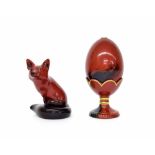 Royal Doulton flambé model of a seated fox designed by Charles Noke, 4.25" high; together with a