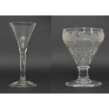 Antique wine glass, the circular funnel bowl on a clear stem and domed circular foot, 6.75" high;