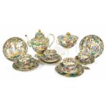 Chinese Canton polychrome tea set, comprising teapot with cover, sucrier, two serving plates and