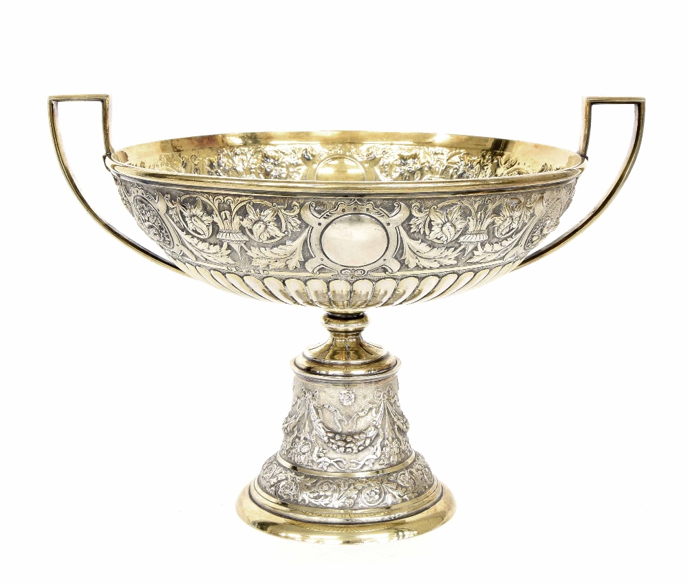 Fine quality Victorian silver-gilt twin-handled comport, decorated in relief floral rondel bosses,