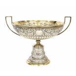 Fine quality Victorian silver-gilt twin-handled comport, decorated in relief floral rondel bosses,